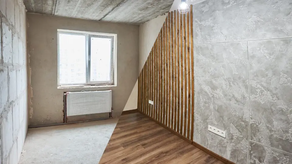 Sanierte Leerwohnung mit Holzpaneelen und Steinoptik an der Wand